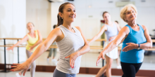 A group of women taking part in a dance class.